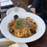 Seafood Paella · Arroz con mariscos. Gluten-free. Peruvian style paella a fresh seafood and rice mixture of c...