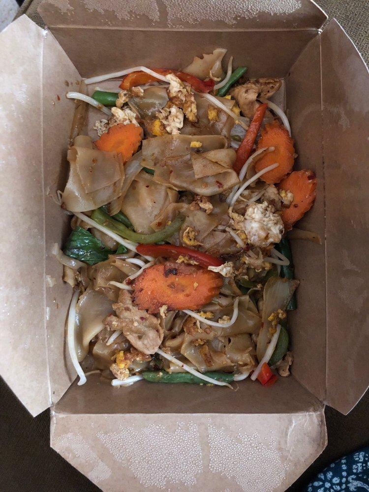Drunken Noodles · Flat rice noodles, green beans, onions, bell peppers, carrots, cage free eggs, cosmo bean sprouts and basil sauteed in our chili garlic sauce.