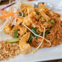 Pad Thai · Skinny rice noodles with organic tofu, cage free eggs, onions, cosmo bean sprouts and crushe...