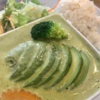 Green Curry · Green curry with bell peppers, carrots, eggplant and basil. Served with jasmine rice and a h...