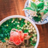 Mama Anh's Pho · Combo | Traditional Vietnamese rice noodles in beef broth with tender slices of rare eye rou...