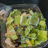 Southwest Chicken Salad · Grilled chicken, corn, black beans, cheddar cheese, greens, Southwest dressing and tortilla ...