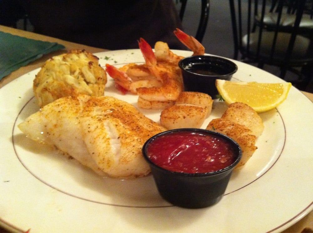 Seafood Platter · New Zealand roughy, lump crab cake, gulf shrimp and scallops (broiled). Served with choice of 2 sides.