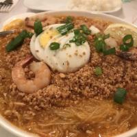 Pancit Palabok Noodle · Rice noodles with shrimp sauce, fish flakes and pork rind.