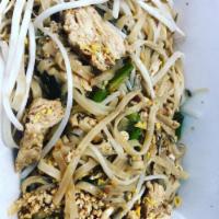 Pad Thai · Stir-fried rice noodle, egg, bean sprout, green onion, and ground peanuts.