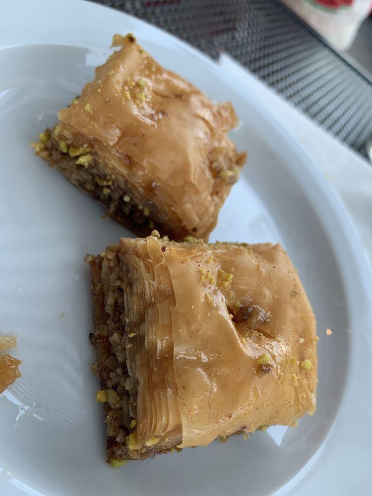 Baklava · Flakey layers of philo dough stuffed with walnuts and topped with syrup.
