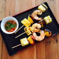 Grilled Shrimp Mango Salad · Grilled shrimp, red onion, crispy shallot, cilantro, scallion and roasted peanut in mango li...