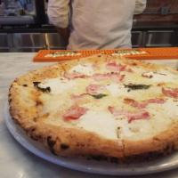 Oro Bianco Pizza · Fresh mozzarella, Buffalo ricotta, Taleggio cheese, pancetta (Italian bacon), Pecorino Roman...