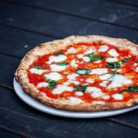 Margherita Pizza · DOP Buffalo mozzarella, Pecorino Romano and basil. Vegetarian.