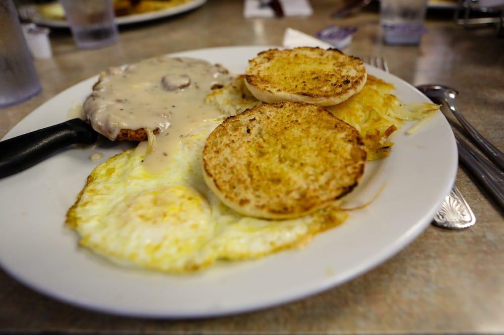 Chicken Fried Steak · Smothered in country gravy and served with 3 large eggs. Served with freshly grated hash browns or home fries and choice of toast.