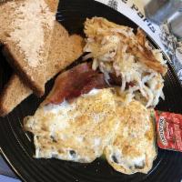 Breakfast Special ·  2 eggs, bacon, hash brown and toast. Not in crepe.