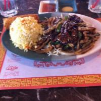 Mongolian Beef · Sautéed beef cooked w/ green onions in sweet sauce