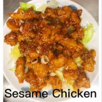 Sesame Chicken · Tender crispy chicken glazed with a sweet sesame sauce.