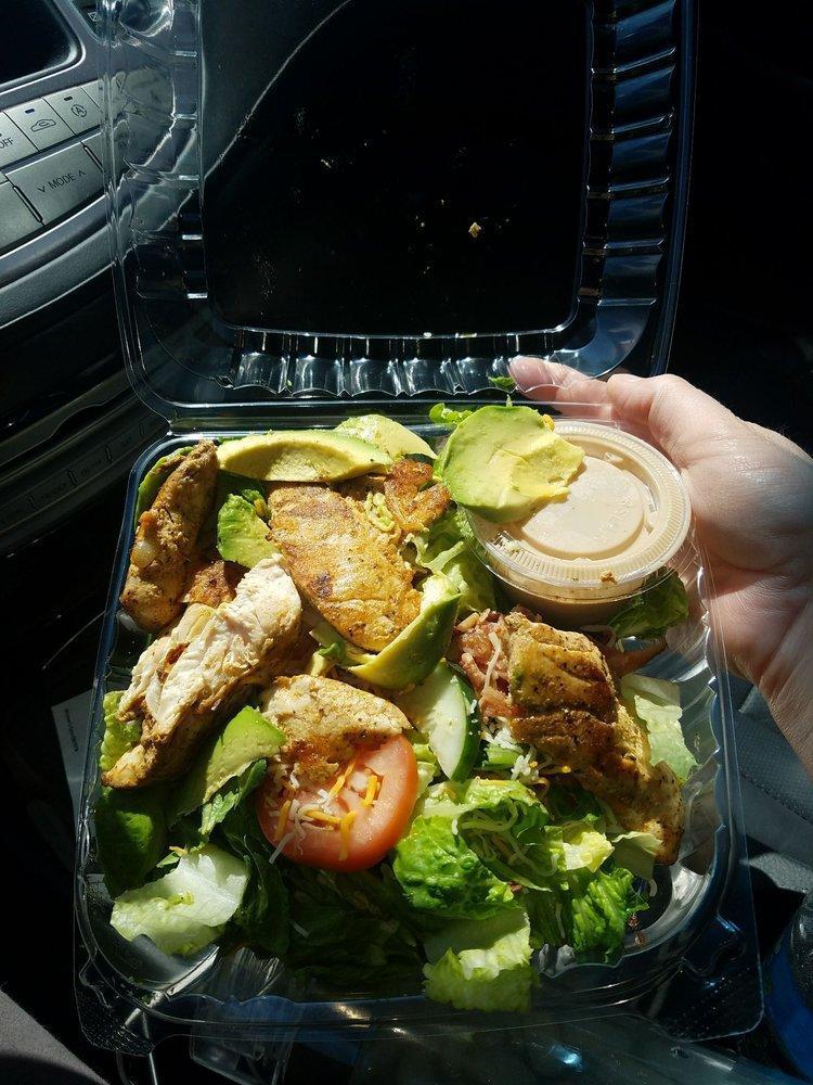 Chicken Avocado Salad · Romaine lettuce, tomatoes, onions, bacon, avocado and shredded cheddar jack cheese.