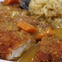Chicken Katsu Curry · Fried chicken cutlet with Japanese curry over rice.