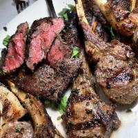 Grilled Baby Lamb Chops · Served with broccoli rabe and roasted potato.