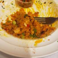 Jambalaya · A mix of Cajun shrimp, chicken, sausage, vegetable and rice, topped with grilled Cajun salmo...