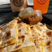 Quesadilla · Monterey Jack cheese and Cheddar cheese melted inside of a large, folded tortilla.