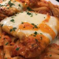Chicken Mama Mia · Chicken cutlet topped with eggplant and mozzarella in a vodka sauce.