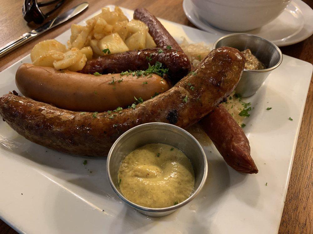 Bavarian Platter · A combination of our locally sourced Azar sausages: Nurnberger, Knockwurst, Frankfurters, and Weisswurst. Served with sauerkraut and Bartkartoffeln.