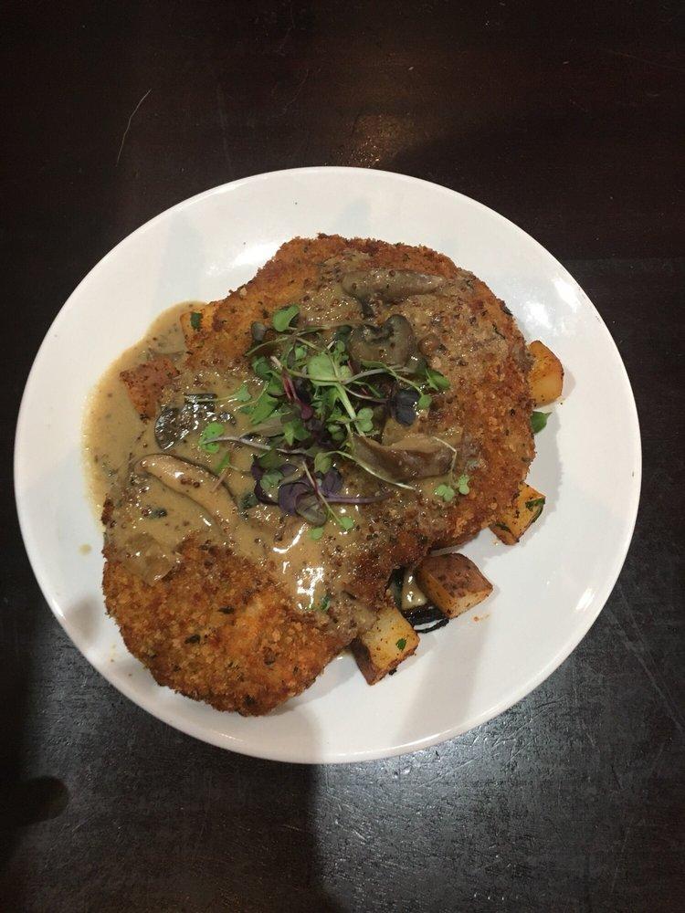 Rahm Schnitzel · Seasoned cutlets, lightly breaded then crisped to a golden brown and topped with cream sauce.