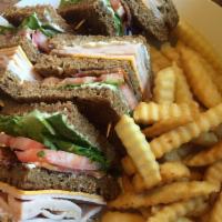 Club Sandwich · Turkey or beef on toasted bread with bacon, cheese, lettuce and tomato.