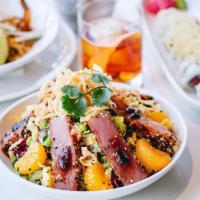 Seared Ahi Salad · Ahi tuna filet, seared rare with Cajun spices. Arugula, radicchio, Napa slaw & spring salad ...