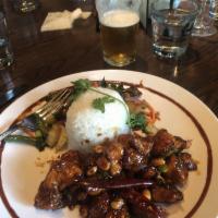 Kung Pao Chicken · Spicy soy ginger glaze and Sambal chili tossed with chicken, green onions, peanuts, dried re...