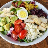 Cobb Salad · Roasted chicken, chopped pepper bacon, Gorgonzola cheese crumbles, cherry tomatoes, sliced K...