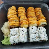 Vegas Roll · Salmon, crab, avocado, cream cheese roll, deep-fried and finished with eel sauce and spicy m...