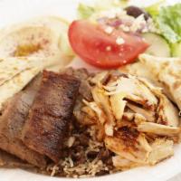 Gyro Platter · Gyro meat, greek salad, fries, tzatziki sauce and a whole pita.

To make changes to this pla...