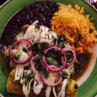 Enchiladas · Chicken or cheese. Green or red sauce. Topped with lettuce, onions, avocado, cheese and sour...