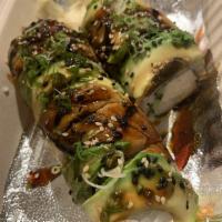 Dragon Roll · In: shrimp tempura, cucumber and crab. Out: unagi, avocado and scallions.