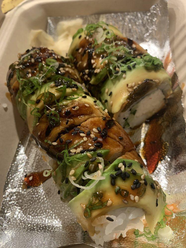 Dragon Roll · In: shrimp tempura, cucumber and crab. Out: unagi, avocado and scallions.
