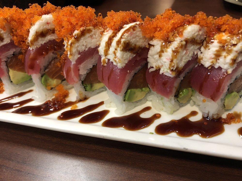 Golden Gate Roll · In: salmon and avocado. Out: tuna, crab and tobiko.