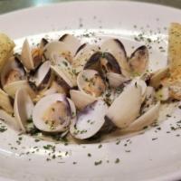 Drunken Mussels & Clams · Fresh mussels and clams sauteed in a garlic, white wine and butter sauce served with garlic ...