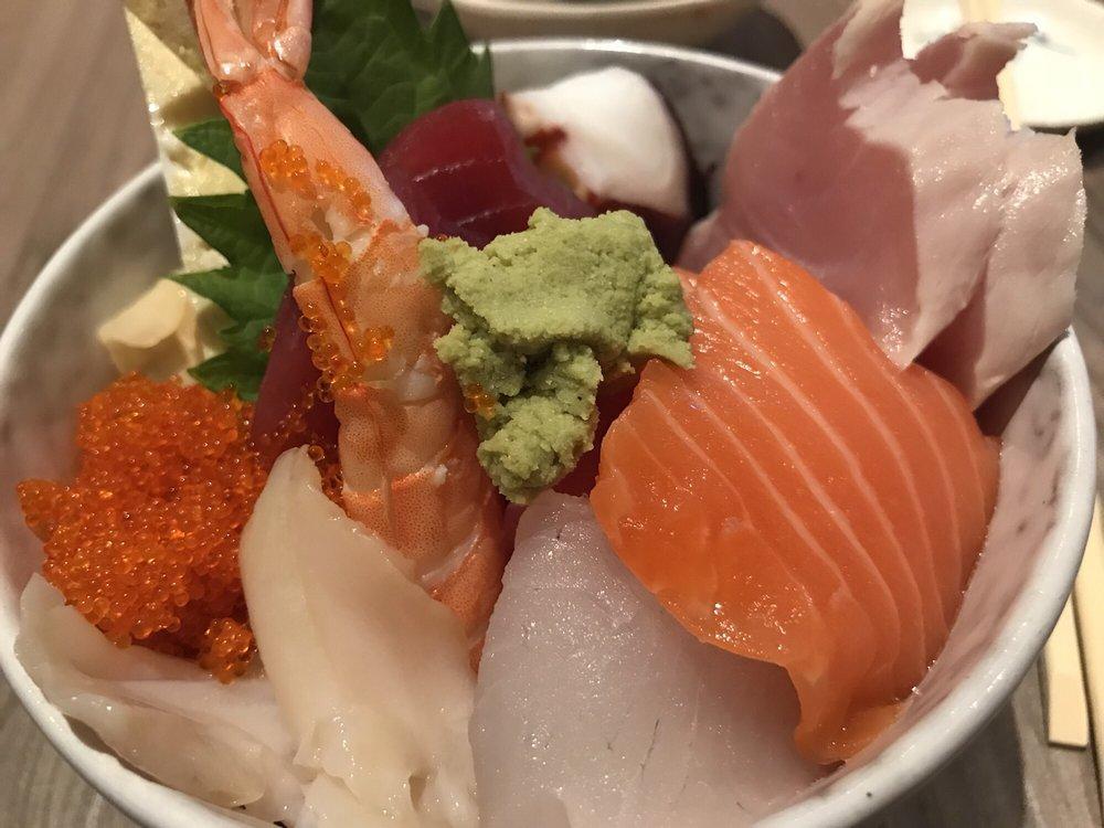 Sashimi · 12 pieces. Includes tuna, salmon, yellowtail, albacore, and white fish.