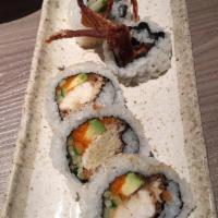 Soft Shell Crab Roll · Deep-fried soft shell crab, avocado, radish sprouts, masago, smelt egg, and cucumber strips.