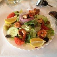 Grilled Shrimp Salad · Tender shrimp served over salad with lemon balsamic vinaigrette.