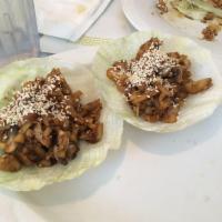 4 Piece Lettuce Wraps · Fresh lettuce cups filled with minced vegetables, tofu and mushroom, stir fried in a delicio...