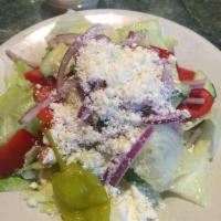 Greek Salad · Add chicken for an additional charge.