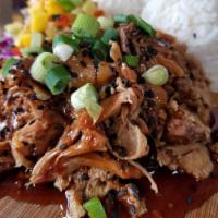 Shoyu Chicken · Pressure cooked in our own Shoyu sauce. Boneless and pulled, this chicken is packed with fla...
