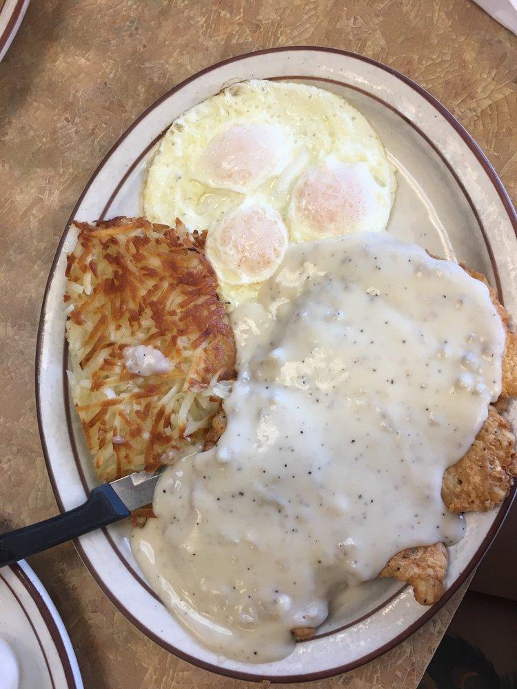 Chicken Fried Chicken · Boneless breast of chicken rolled in a seasoned breading, fried to order, and topped with country gravy. A twist on our country fried steak.