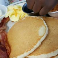 Swedish Pancake Breakfast · Crepe style pancakes rolled then topped with glazed strawberries or marion berry topping and...