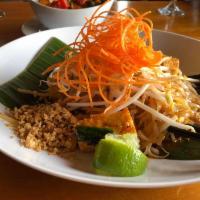 Pad Thai · Traditional Thai noodles with chicken or beef stir fried with garlic, onion, bell peppers, c...