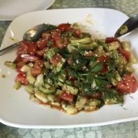 Avocado Salad · Avocado, tomatoes, onion and cilantro with teriyaki dressing. 