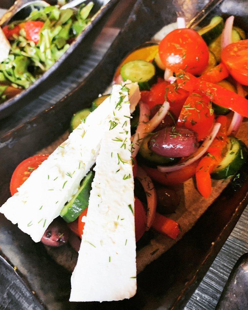 Greek Salad · Romaine lettuce, cherry tomato, cucumber, red onion, bell pepper, feta cheese, dill, olive and dressed with olive oil.