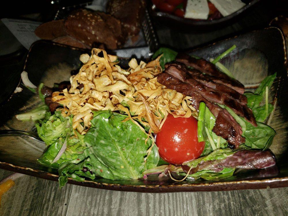 Skirt Steak Salad · Mixed greens, tomato, red onion, grilled skirt steak, dressed with mustard honey sauce.