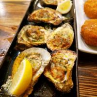 Charbroiled Oysters · Live oysters charbroiled with house-made Bayou butter.