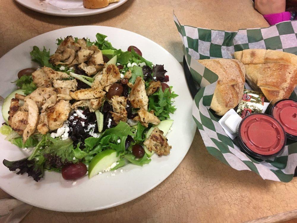 Apples and Goat Cheese Salad · Sliced green apples, crumbled goat cheese, dried cranberries and red grapes on a bed of chopped romaine and spring mix lettuce dressed with our homemade red raspberry vinaigrette. Add protein for an additional charge.